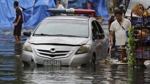 Typhoon Nock-Ten kills four in the Philippines