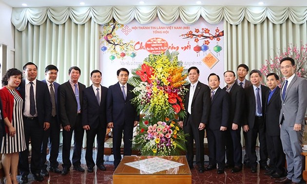 Hanoi leader visits Evangelical Church ahead of Tet