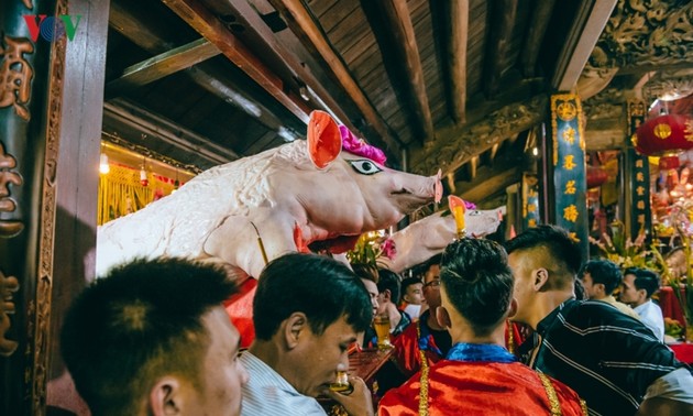 La Phu village preserves communal house, pig procession festival 