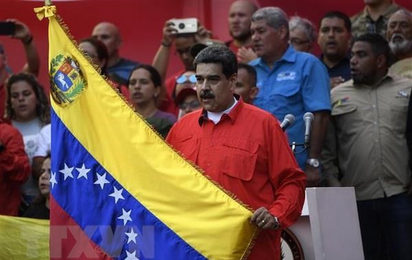 Venezuelan President urges armed forces to defend democracy