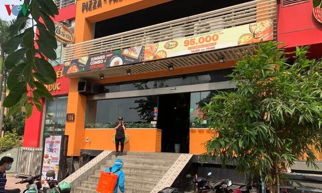 Hanoi locks down area linked to suspected COVID-19 case