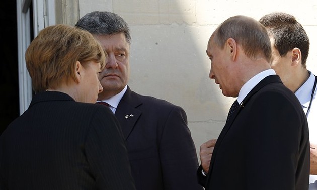 Poutine, Merkel, Hollande et Porochenko ont discuté de l’Ukraine