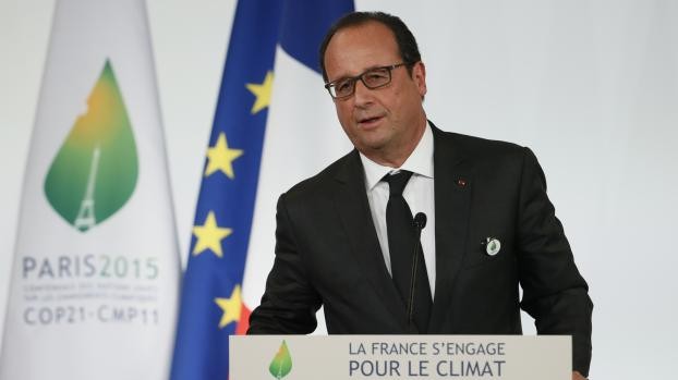 COP21 : Hollande "lance un appel" à "dépasser les intérêts" particuliers