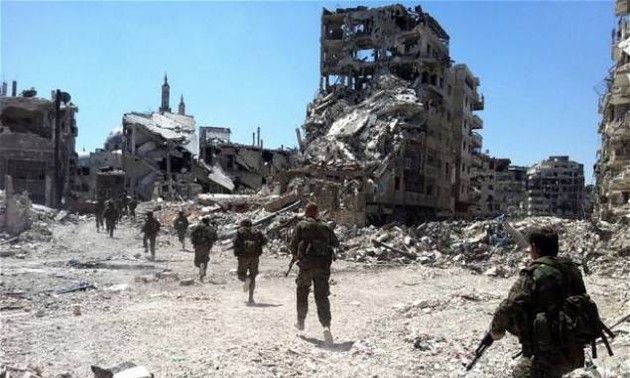 Syrie : les opposants vont remettre une partie de leurs armes lourdes