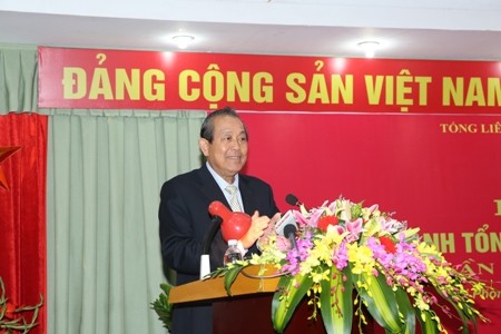 Truong Hoa Binh à une réunion de  la CGT du Vietnam 