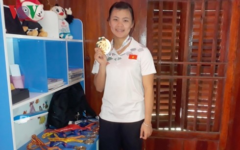 Atlet Quang Thi Thu Nghia-Gadis emas pencak silat dari etnis minoritas Thai