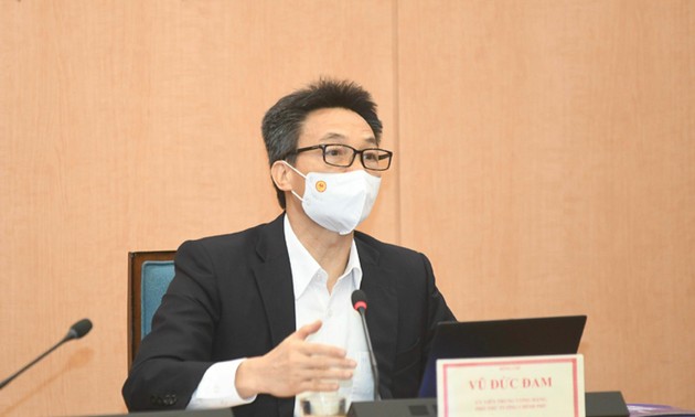 Deputi PM Vu Duc Dam Lakukan Temu Kerja dengan Kota Ha Noi tentang Pencegahan dan Penanggulangan Wabah Covid-19