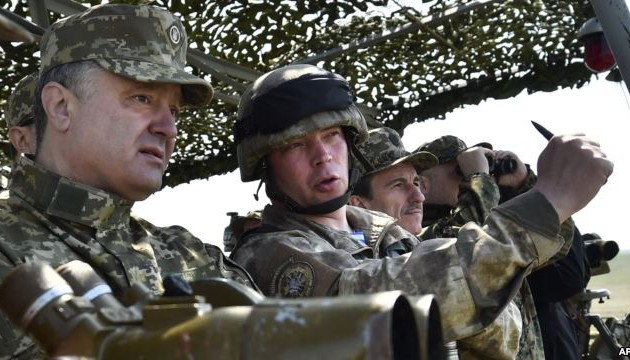 Eastern Ukraine fighting continues despite ceasefire 