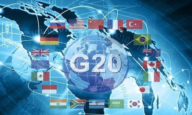 G20 ໃຫ້​ຄຳ​ໝັ້ນ​ສັນ​ຍາ​ໜູນ​ຊ່ວຍ​ການ​ສ້າງ​ດ້ານ​ການ​ເງິນ ແລະ ເສດ​ຖະ​ກິດ​ທົ່ວ​ໂລກ​ໃຫ້​ເປັນ​ປົກ​ກະ​ຕິ