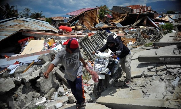  IMF  mengumpulkan dana  untuk memberikan  bantuan kepada para korban gempa dan tsunami di Indonesia