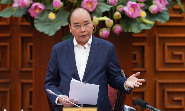 PM Nguyen Xuan Phuc mengirim tilgram untuk menyapa situasi wabah penyakit  radang paru-paru karena  virus Corona di Tiongkok