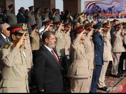   Egyptian Supreme Court freezes Presidential decree
