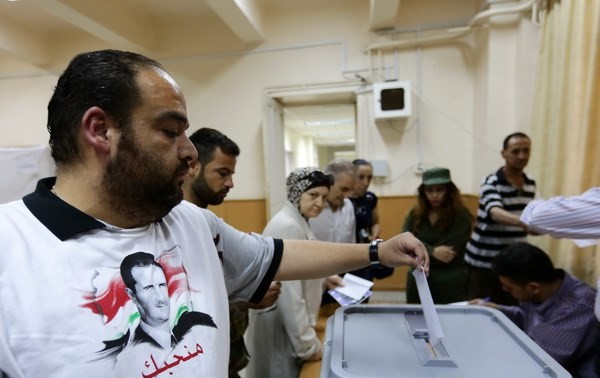 Syrians begin to vote in presidential election