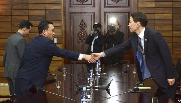 Two Koreas agree on high-level talks next month
