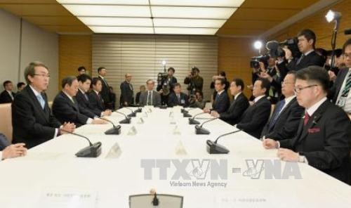 Japanese cabinet approves TPP