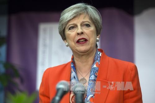 British PM Theresa May makes no change to top ministers