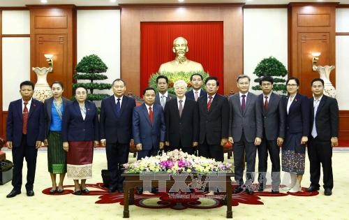 Nguyên Phu Trong reçoit une délégation du Parti Populaire Révolutionnaire du Laos