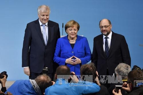 Allemagne : entre Martin Schulz et Angela Merkel, un accord macronien