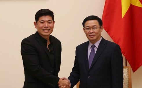 Vuong Dinh Huê reçoit le directeur exécutif de Grab