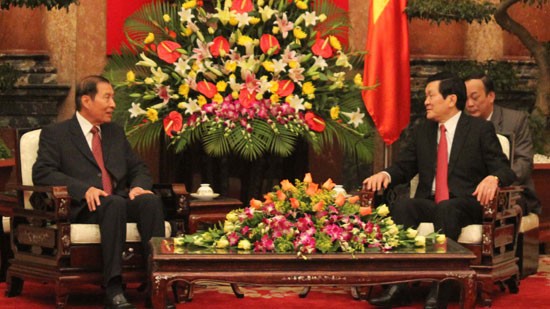 张晋创会见老挝国家主席府部长蓬沙瓦·布法