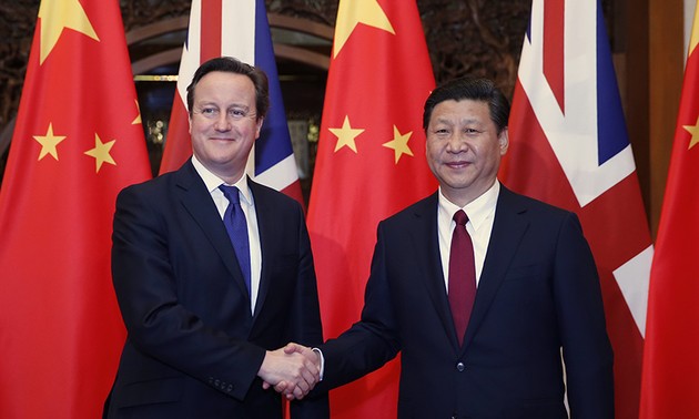 中国国家主席习近平会见英国首相卡梅伦