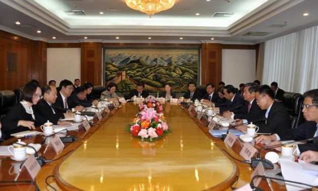 越中陆地基础设施合作工作组部长级会议在北京举行