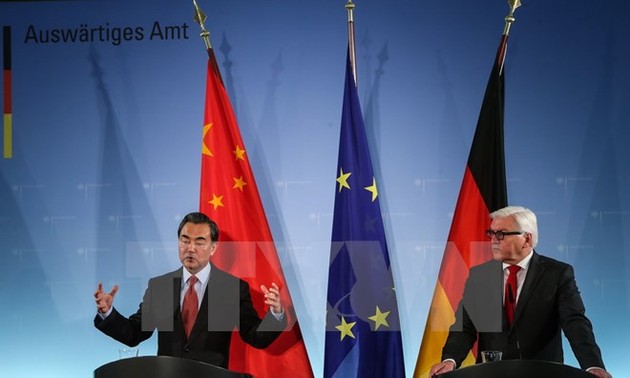 德中一致同意合作解决国际冲突