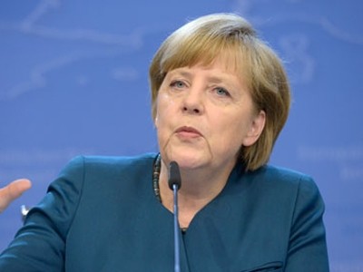 德国总理默克尔：要尽早解决移民危机