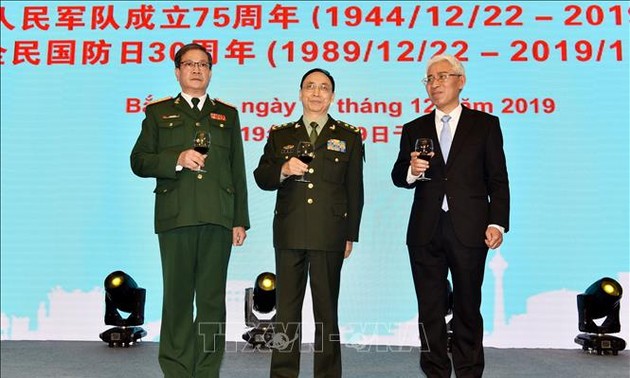 越南人民军建军75周年和全民国防日30周年纪念活动在中国举行