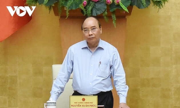 越南政府总理阮春福值防范流行病国际日之际发表公开信