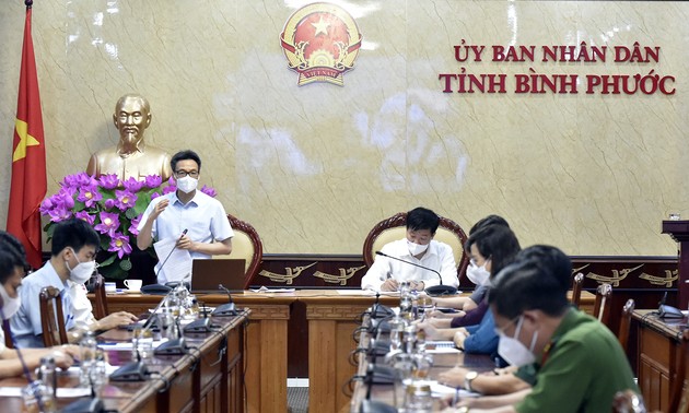 越南政府副总理武德担：发挥社区新冠肺炎疫情防控小组的作用