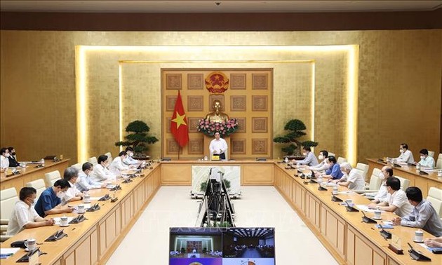 越南政府总理范明政：科学家和医务人员是防疫骨干力量