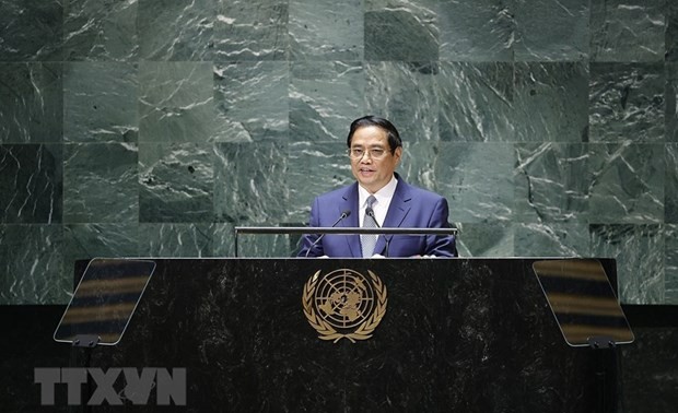 越南政府总理范明政: 推动双多边合作，有效应对全球性挑战