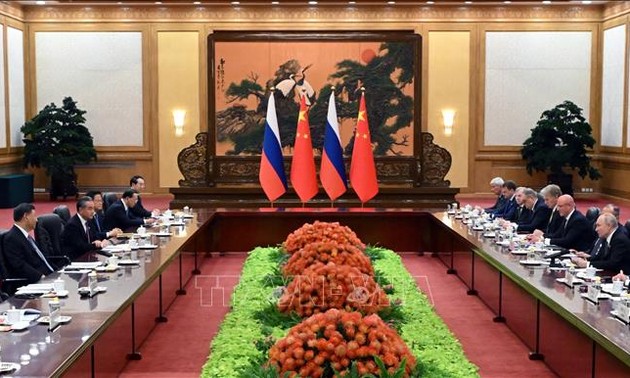 中俄愿合作提升双边关系水平