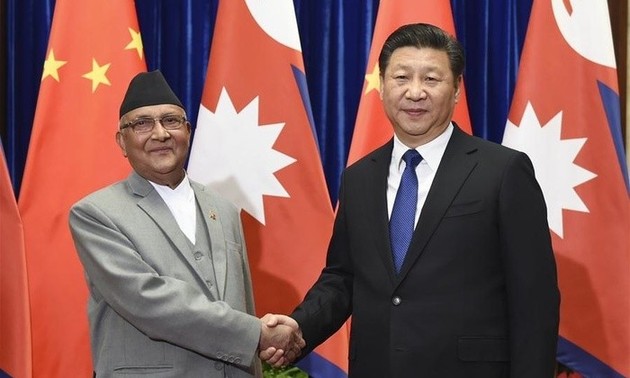 Chinas Staatschef Xi Jinping führt Gespräch mit Nepals Premierminister Sharma Oli