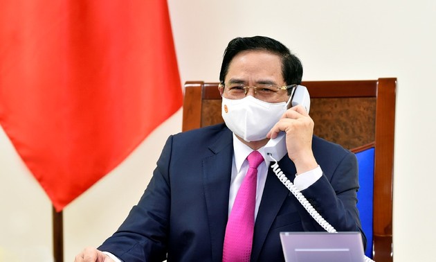 Premierminister Pham Minh Chinh führt Telefongespräch mit dem japanischen Amtskollegen Suga Yoshihide