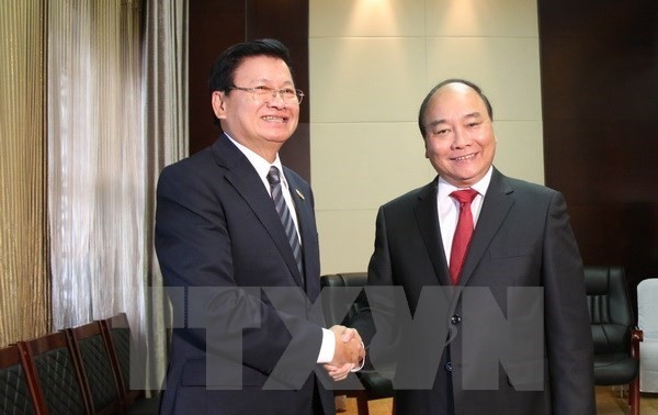 老挝总理通伦出席并共同主持越老政府间合作委员会第三十九次会议