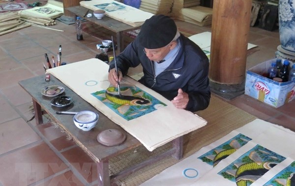 Unterlagen des Berufs zur Herstellung von Dong Ho-Bildern für Unesco-Vorlage fertig stellen
