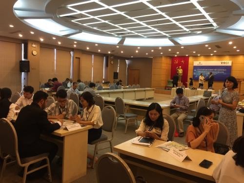 Treffen von vietnamesischen und omanischen Unternehmern