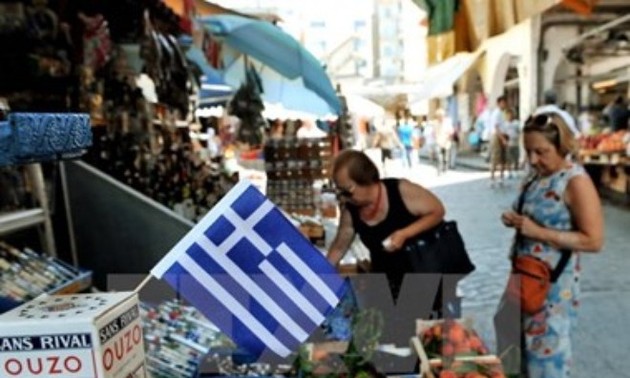 Yunani akan menerima 13 miliar Euro yang pertama dalam paket talangan baru untuk membayar utang