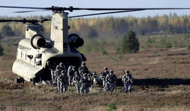 NATO memperkuat pasukan reaksi cepat dan menggelarkan lagi pangkalan militer