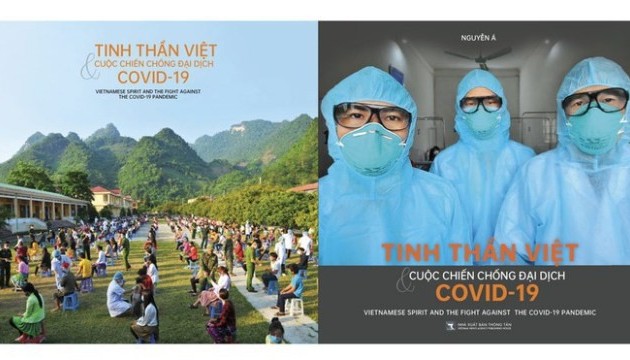 Meluncurkan buku “Semangat Vietnam dalam perang melawan pandemi Covid-19”