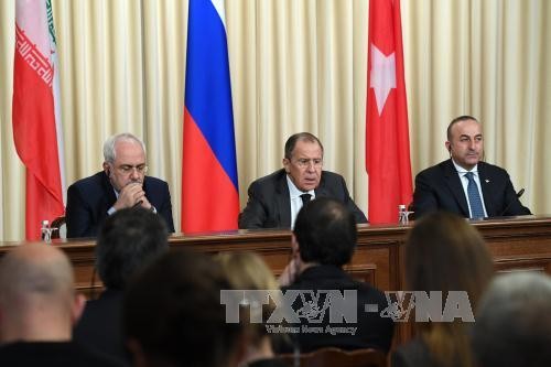 Russia, Iran, and Turkey vow to speed up ceasefire in Syria