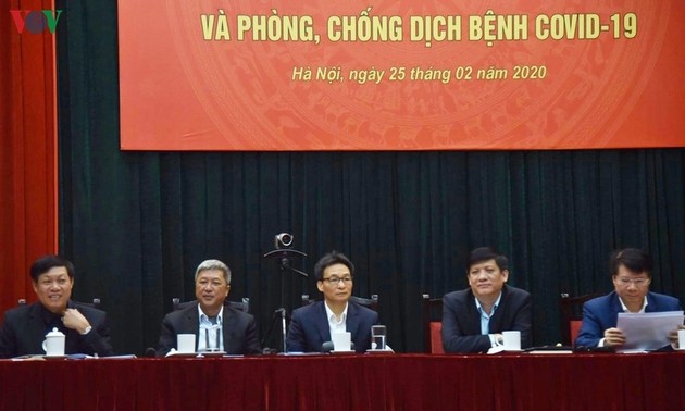 Вице-премьер Ву Дык Дам принял участие в конференции по профилактике и борьбе с эпидемией  Covid 19
