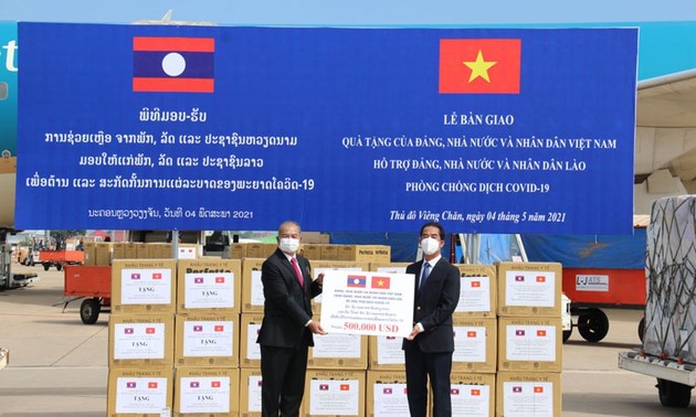 Laos, Vietnam join hands to defeat pandemic, stabilize people’s lives