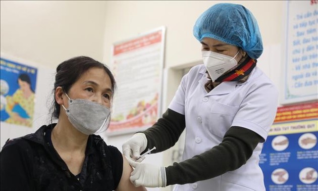 Vietnam records 26,500 new cases of COVID-19 on Friday 