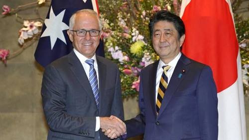 Australia, Japan vow to sign trans-Pacific trade pact