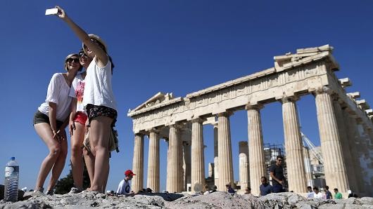 Fitch upgrades Greece to 'CCC' after new bailout 