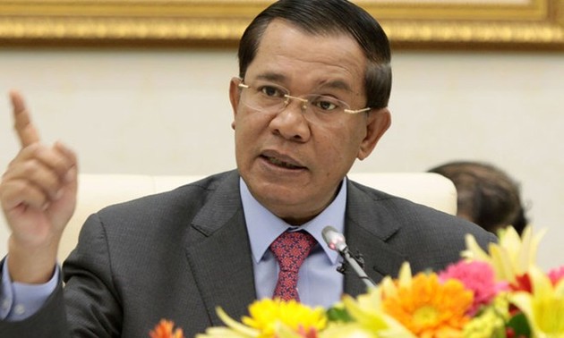 Cambodian PM warns legal action against opposition leader