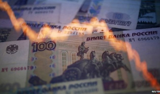 Russia’s ruble and Canada’s dollar drop to record low 
